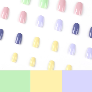 Glossy macaron color press-on nail kit featuring round medium-long fake nails set