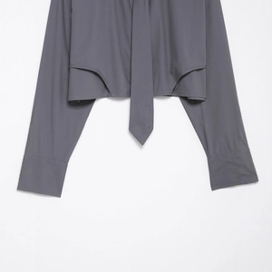Deep grey long sleeve poplin shirt with unique tie detail and irregular hem design