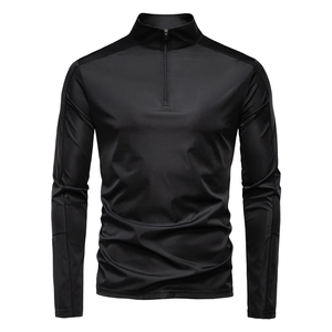Detail of the high collar and 1/4 zip closure on this black long sleeve sun protection shirt