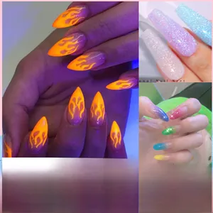 Detail of neon flame nail art and colorful glitter poly gel extensions in various styles