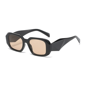 Modern geometric sunglasses with black polygonal frame and light brown tinted lenses