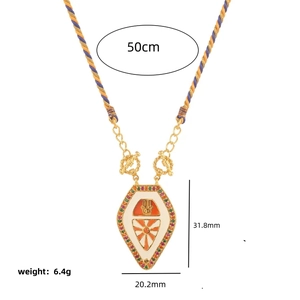 Retro tarot necklace with white orange enamel sun pendant on blue gold cord chain