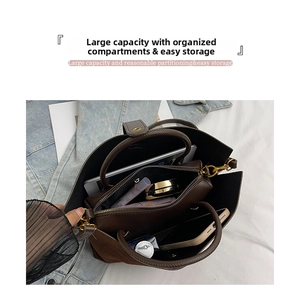 Macro view of dark brown leather tote interior with spacious multi-compartment storage