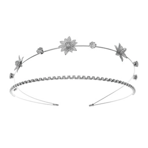 Detailed close-up of hollow alloy mask headband featuring silver flowers and rhinestones