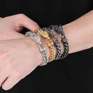 Men's titanium steel dragon head bracelet in four metallic finishes shown on wrist