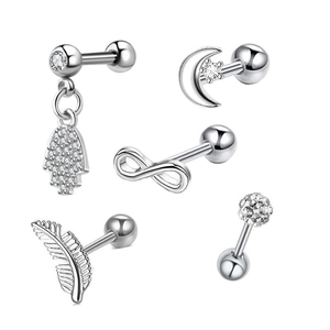 Close-up of a 5-piece silver stainless steel stud set with zircon geometric shapes