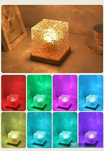Detail view of cube water ripple lamp with wood base and multiple RGB color modes