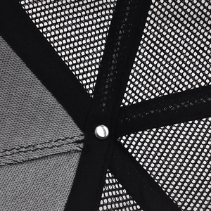 Close-up of the breathable black mesh interior and reinforced seams of the baseball cap