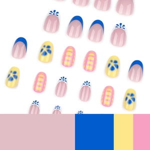 Short round French fake nails with blue floral and abstract patterns on white background