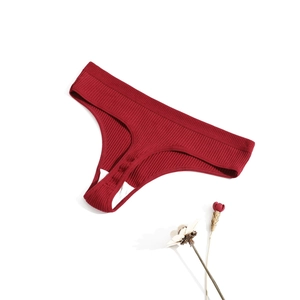 Deep red ribbed cotton thong for women with wide elastic waistband on white background