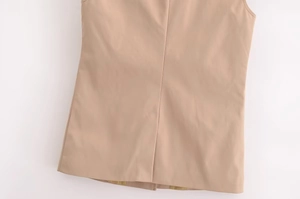 Detail view of khaki sleeveless blazer back showing high-quality stitching and fabric texture