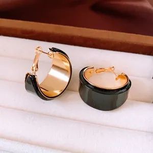 Vintage 18K gold plated C-shaped earrings with black resin inlay for women