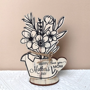 Detail of wooden Mother's Day flower pot decor with Happy Mother's Day engraving