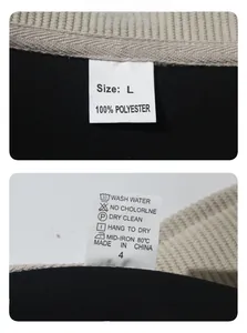 Detailed view of the 100% polyester wash label and size L tag on the corduroy shirt