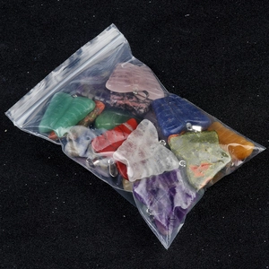 Assorted natural crystal butterfly pendants in amethyst and rose quartz with silver bails