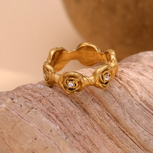 Detail of 18K gold plated stainless steel rose flower rings with zircon crystals