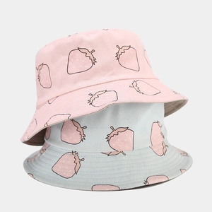 Cute strawberry print canvas bucket hats in pink and blue for sun protection and casual wear