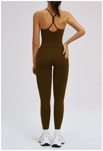 Detail view of olive green yoga set with Y-shaped back straps and high waist leggings