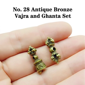 Macro shot of Antique Bronze Vajra and Bell set for DIY Tibetan Buddhist jewelry