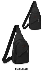 Detail of black canvas chest bag with adjustable strap and brown sport logo patch
