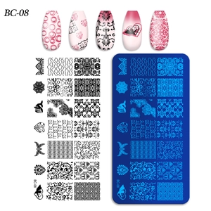 Macro detail of BC-08 nail art stamping plate with heart and cupid etched patterns