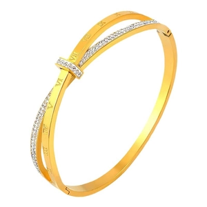 Golden titanium steel bangle with Roman numeral engravings and pavé set rhinestones