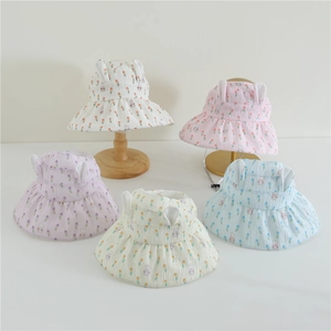 Detail of multi-color kids sun hats with 3D bunny ears and tulip floral prints