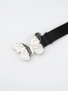 Close-up of black leather belt featuring a detailed silver metal butterfly buckle