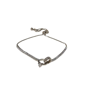 Silver-toned zircon tennis bracelet with interlocking rings and adjustable slider clasp