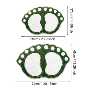 Detailed size comparison of two green foot-shaped bathroom mats with pebble texture