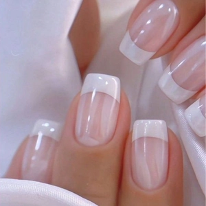 Elegant long square French press-on nails with nude pink base and white tips