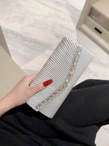Elegant silver pleated silk clutch bag with crystal rhinestone trim for evening events
