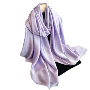 Elegant light purple satin scarf with silk-like sheen hanging on a white background