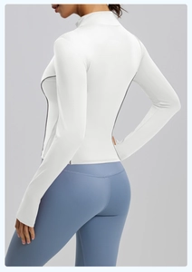 Close-up of white slim-fit yoga jacket featuring peach line design and high-neck zipper