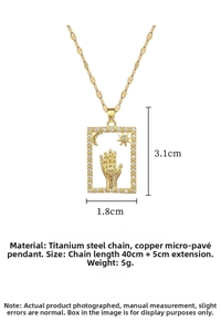 Detailed size view of gold titanium steel necklace with mystical sun and moon pendant