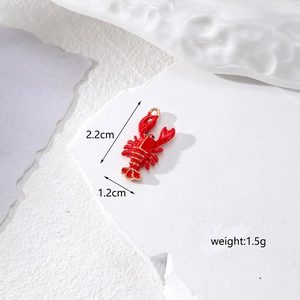 Detail of red lobster alloy charm with size dimensions 2.2cm x 1.2cm for DIY jewelry