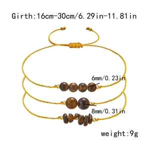 Detailed view of three braided tiger eye stone bracelets with adjustable waxed cords
