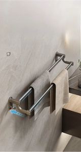 Detail of gunmetal grey double towel bar with polished finish and integrated side hooks