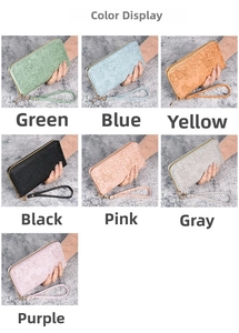 Color display of long floral embossed zip wallets with wristlets in seven stylish shades
