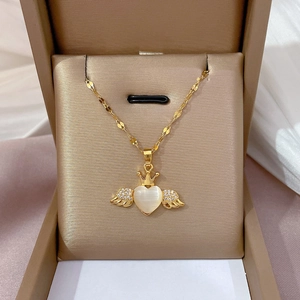 Gold titanium angel wing heart necklace with cat eye stone in a luxury gift box