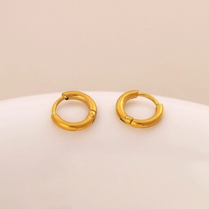 Detailed view of pair of minimalist 18K gold plated stainless steel hoop earrings