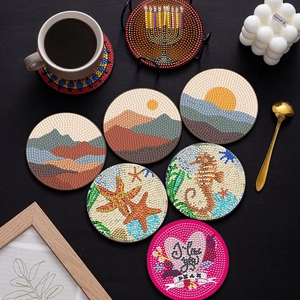 DIY diamond painting coaster set with mandala and heart designs for home decor