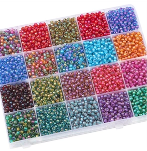 Macro shot of 24-compartment storage box with assorted 4mm colorful glass seed beads