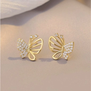 Elegant gold butterfly stud earrings with micro-pave cubic zirconia and hollow design