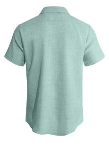 Detail view showing back side texture and mint green fabric of the short sleeve shirt