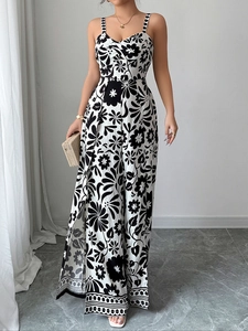 Detail of floral wide-leg jumpsuit with v-neck knot design and side leg slits