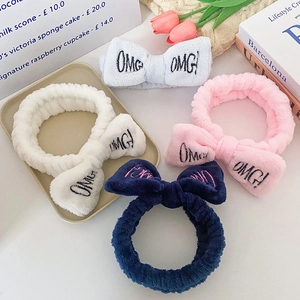 Plush OMG bow headbands in four colors for facial washing and spa routines