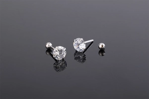 Close-up of S925 silver screw-back stud earrings with four-prong round zircon setting