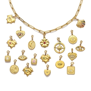 Gold-plated stainless steel charm set including heart and evil eye designs for DIY jewelry
