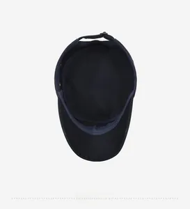 Detail view of cotton military cap inner lining with neat stitching and metal buckle